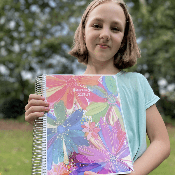 girl with Erin Condren planner