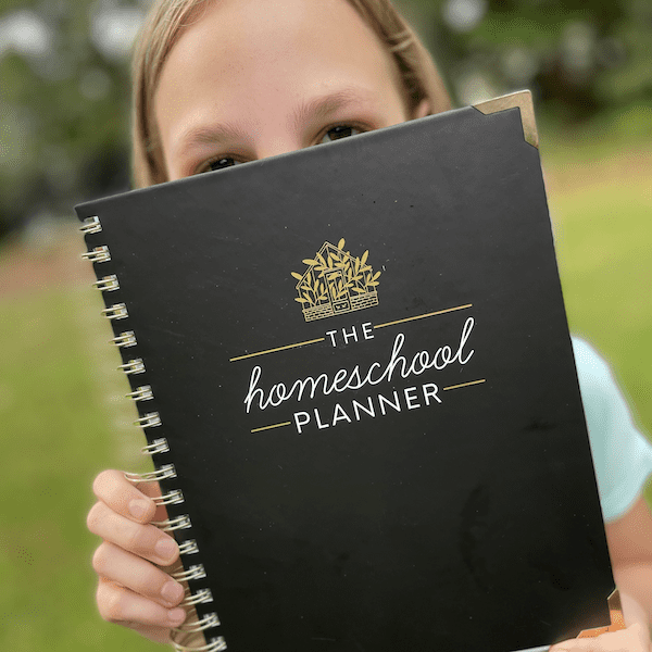 Peaceful Press Homeschool Planner with girl