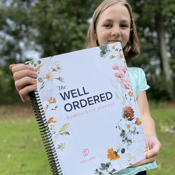 Well ordered Homeschool Planner with girl