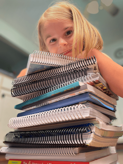 girl smiling with planners