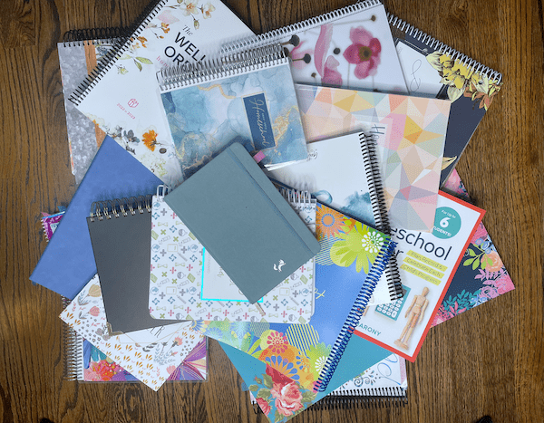 Pile of planners for homeschoolers