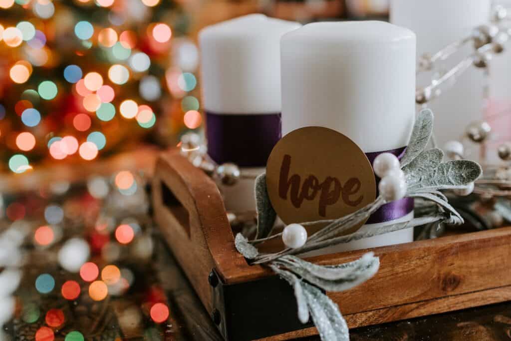 two white pillar candles what is advent