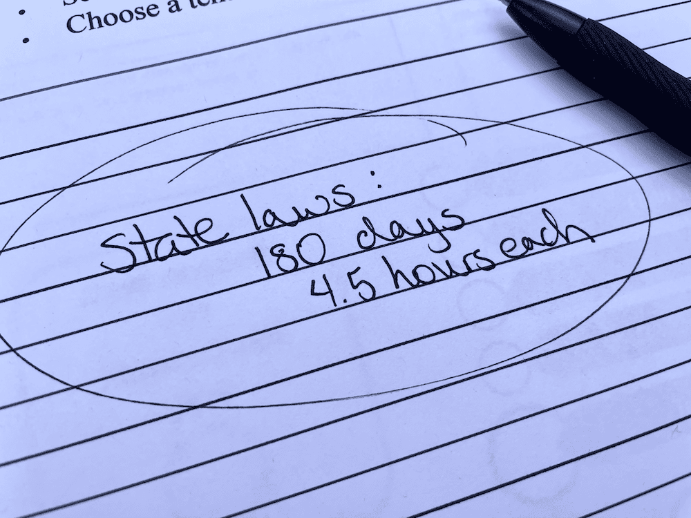 handwriting on a paper. state laws: 180 days, 4.5 hours each