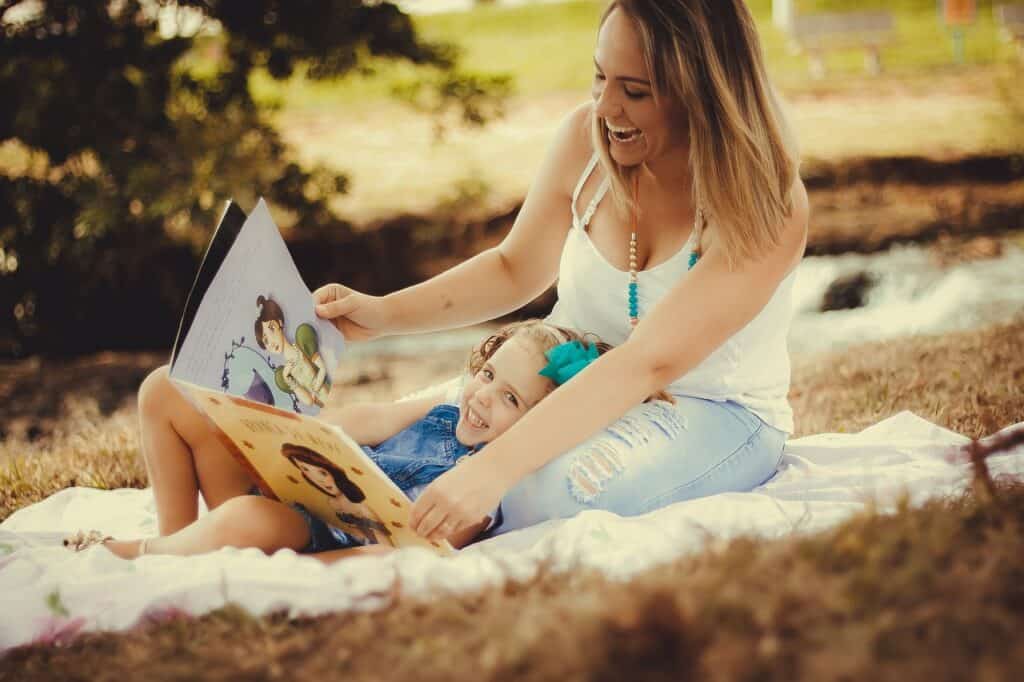 mother and daughter, picnic, enjoying a morning meeting 