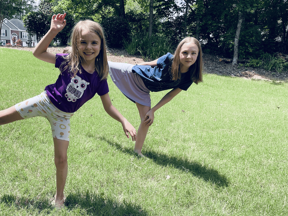 two young girls balancing for flexible homeschool