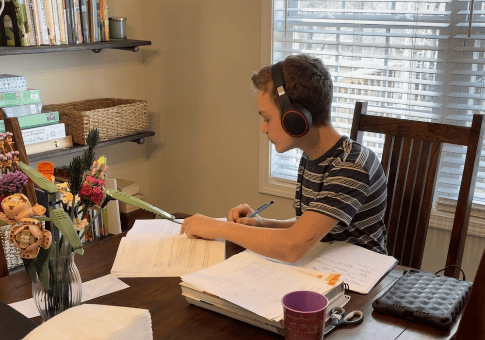 teen doing school on his own, homeschooling multiple ages