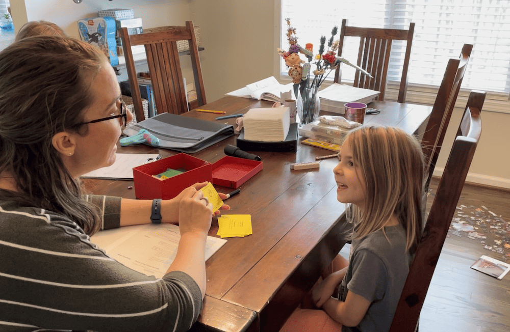 mom and daughter homeschooling together