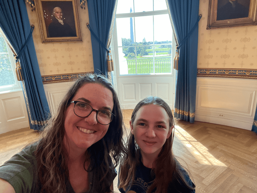 mom and daughter in the blue room of the White House