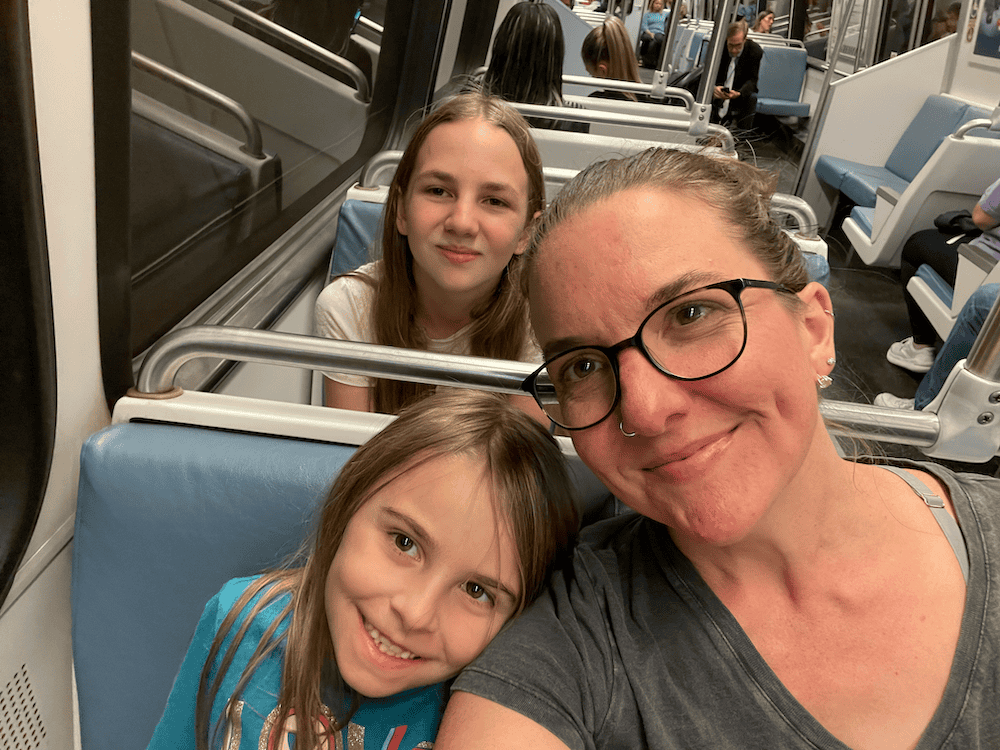 mom and kids on subway. Washington DC with kids